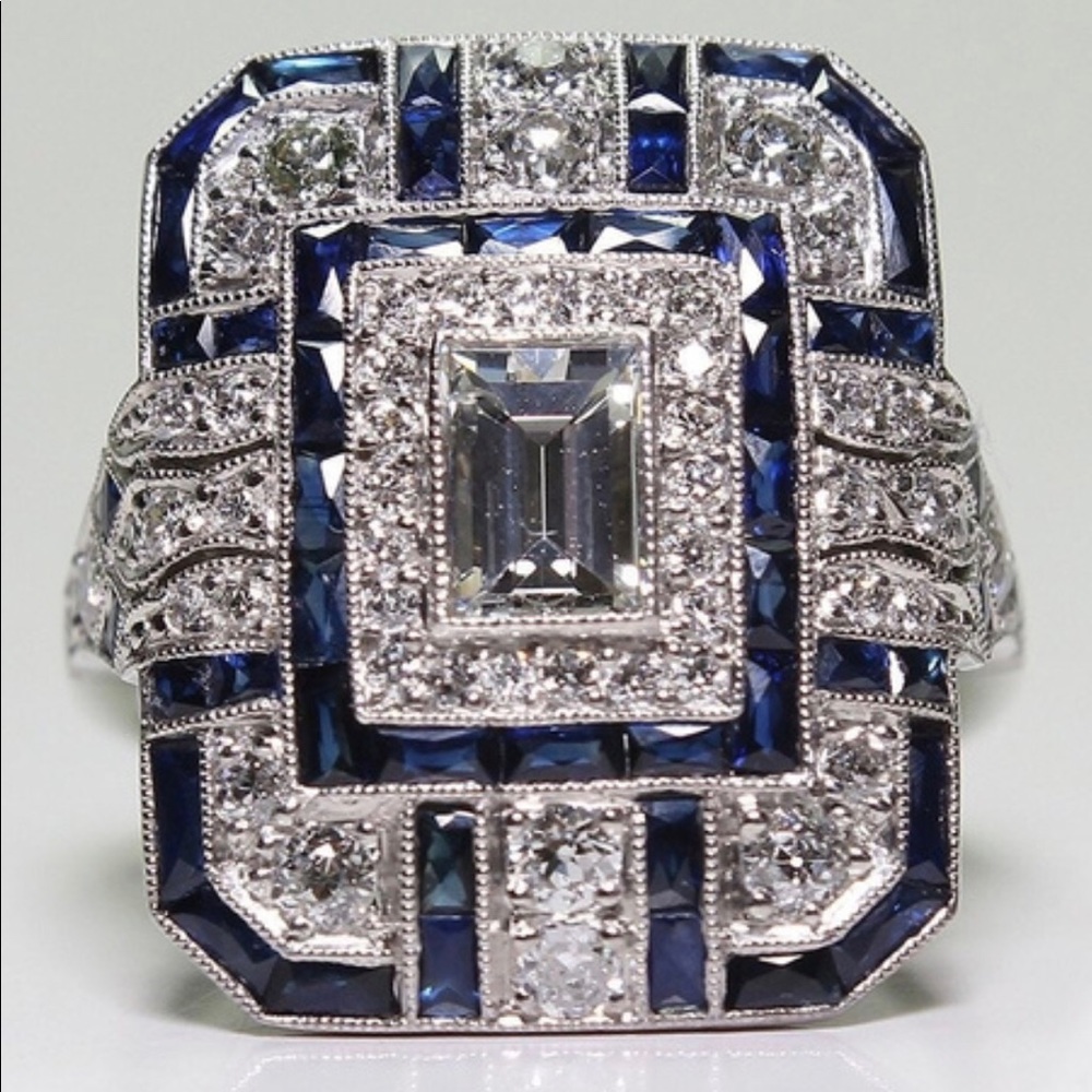 Beautiful antique look,silver plate, white and blue czs Size 11.